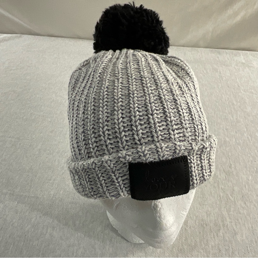 LOVE YOUR MELON WOMEN’S BLACK SPECKLED POM BEANIE HAT WITH BLACK LEATHER PATCH